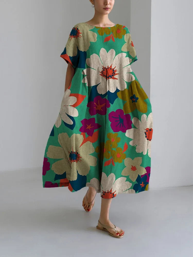Buntes, geblümtes Damenkleid mit lockerem Rundhalsausschnitt und mittellangem Rock 