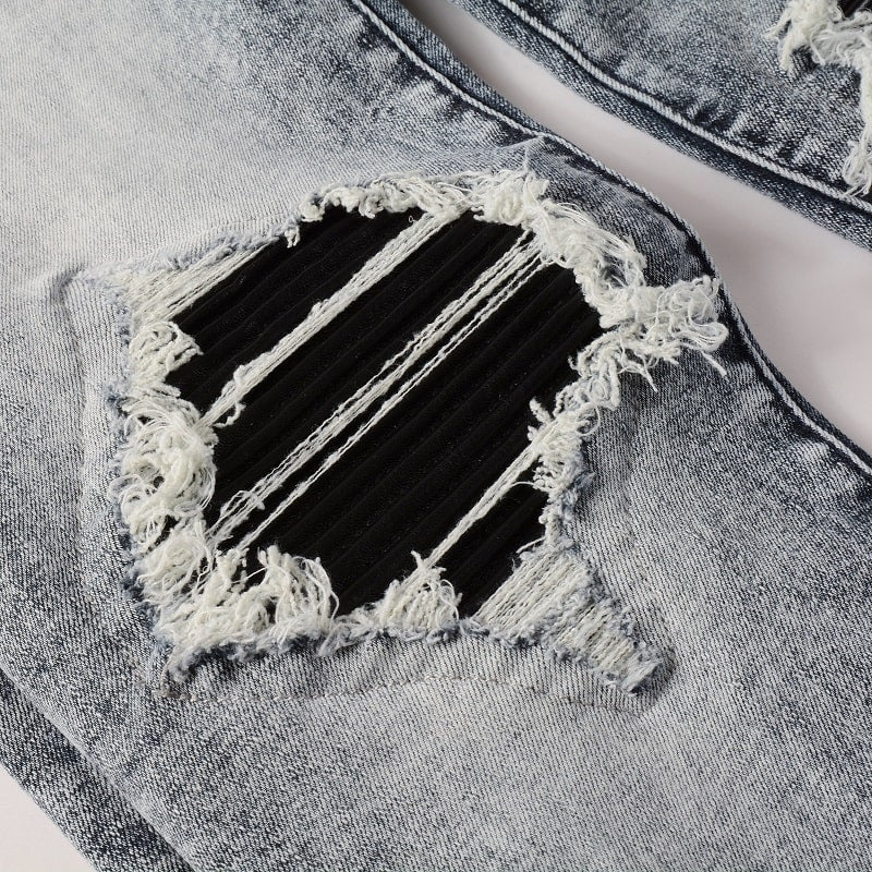 Blackout Distressed Slim Jeans