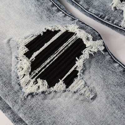Blackout Distressed Slim Jeans