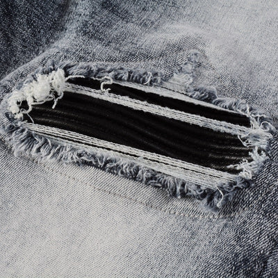 Blackout Distressed Slim Jeans