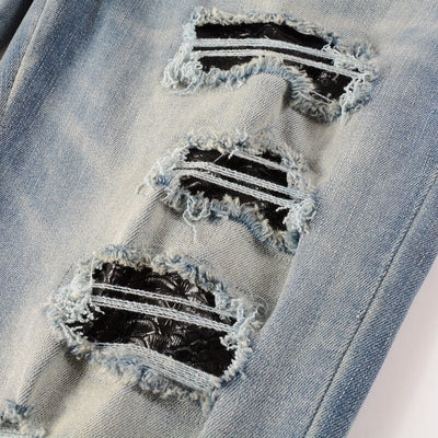 Serpent Strike Distressed Jeans