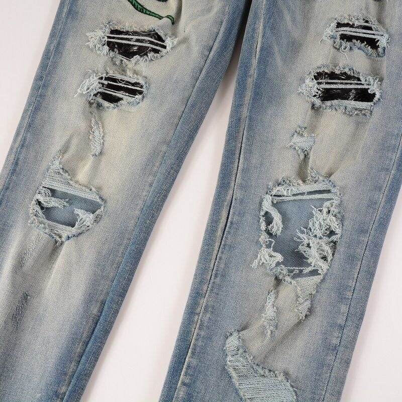 Serpent Strike Distressed Jeans